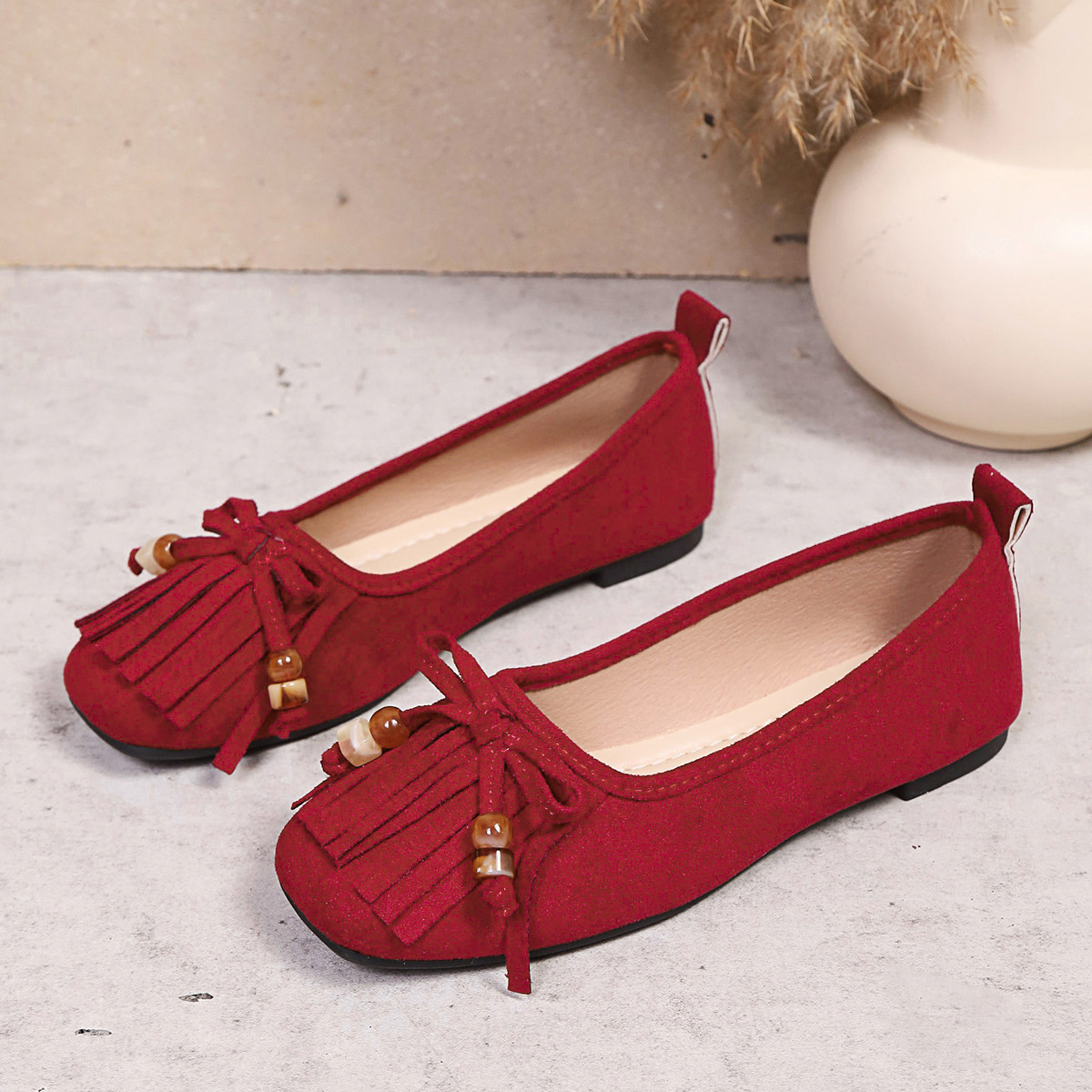 Suede Fringe Slip-Ons