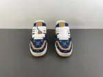Louis Vuitton LV Trainer in deep royal blue, brown, and denim.