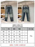 Dior distressed and ripped washed denim jeans with letter patch
