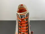 Christian Dior running shoes, brown and orange.