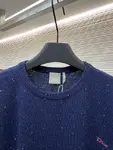 Dior monogrammed color-blocked embroidered wool knit sweater