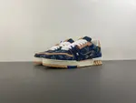 Louis Vuitton LV Trainer in deep royal blue, brown, and denim.