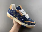 Louis Vuitton LV Trainer in deep royal blue, brown, and denim.