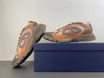 Christian Dior running shoes, brown and orange.