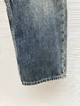 Dior distressed and ripped washed denim jeans with letter patch