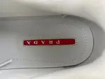 Prada America, royal blue and greyish white