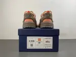 Christian Dior running shoes, brown and orange.