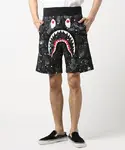 BAPE streetwear brand shark head glow-in-the-dark shorts with side paneling