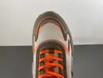 Christian Dior running shoes, brown and orange.