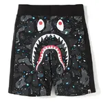 BAPE streetwear brand shark head glow-in-the-dark shorts with side paneling