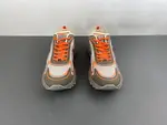 Christian Dior running shoes, brown and orange.