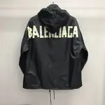 Balenciaga masking tape trench coat