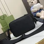 Gucci Crossbody Bags A range of men's bags in black rubber effect leather Model: 771293. Dimensions: 17* 24* 5cm