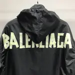 Balenciaga masking tape trench coat