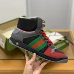 GU*IHigh-top Distressed sneakers