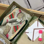 GU*IHigh-top Distressed sneakers