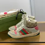 GU*IHigh-top Distressed sneakers