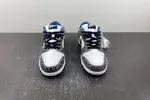 Supreme × Nike SB Dunk Low “White Cement 304292-001