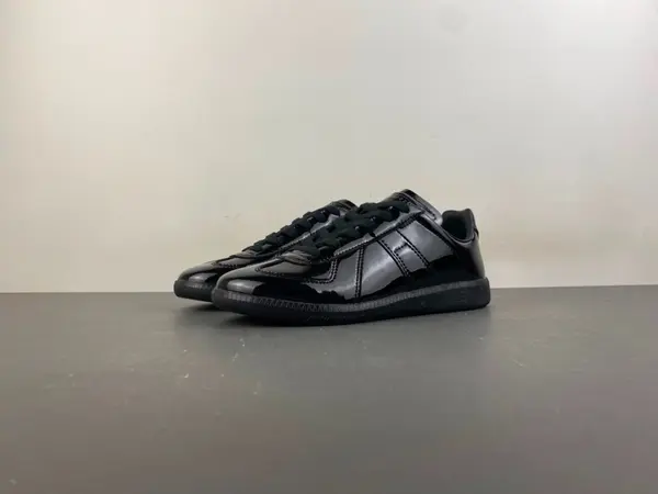 Maison Margiela Replica All-Black Glossy Leather Low-Top Sneakers (Style No. S58WS0109)
