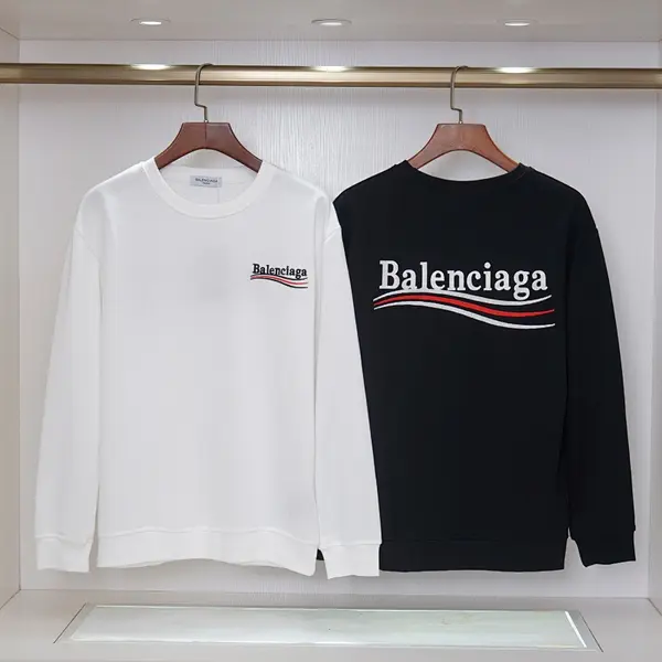 Balenciaga classic crew neck sweatshirt with embroidered logo on the front and back, black and white.