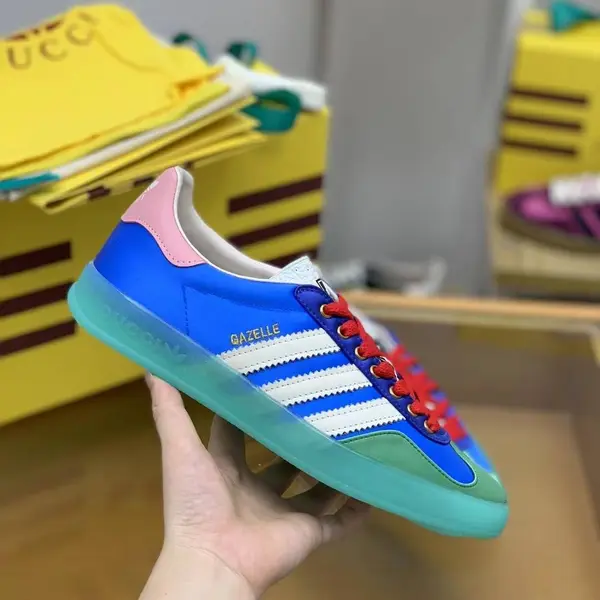 GU*I× Adidas sneakers