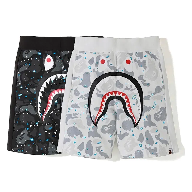 BAPE streetwear brand shark head glow-in-the-dark shorts with side paneling